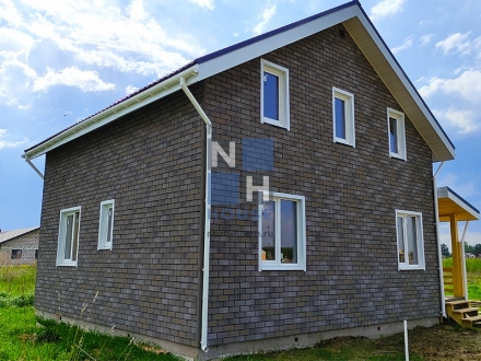 Дом облицованный фасадной плиткой HAUBERK